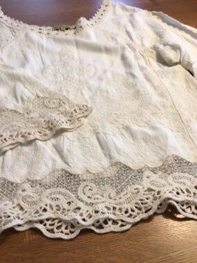 Democracy ivory crochet/lace top with bell sleeves.